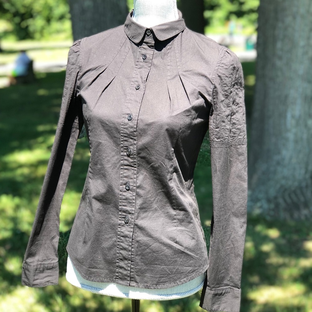 Black button-down long sleeve top.